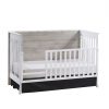Metro crib in white used as toddler bed with gate
